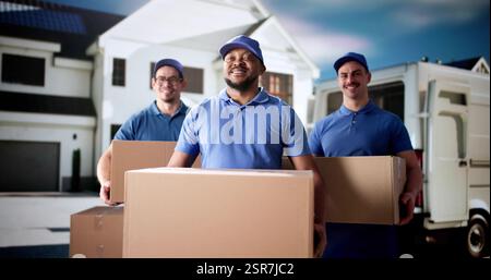 Diverse group of movers smiling in front of delivery van. Stock Photo
