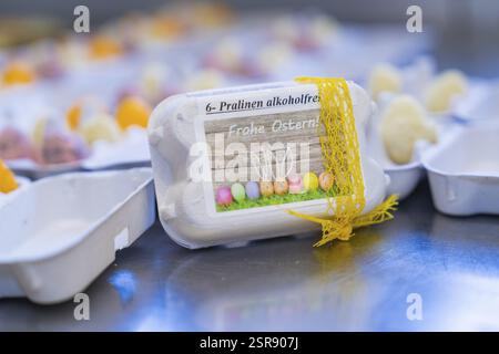 Wrapped Easter egg chocolates with colourful decoration and Easter theme, Easter baking and chocolate icing at Haselstaller Hof, Gechingen, Black Fore Stock Photo