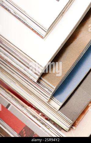 Several Magazines several newspapers, journals stacked Stock Photo - Alamy