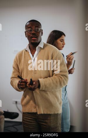 Multicultural team engaged in productive business meeting Stock Photo