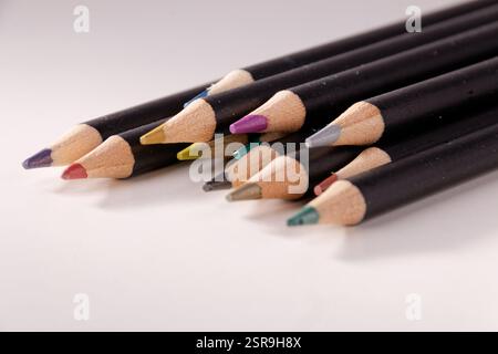 A set of colored pencils is shown with white background, close up image Stock Photo