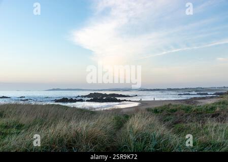Peaceful evening at Porth Nobla near Rhosneigr on the coast of Anglesey, North Wales. Stock Photo