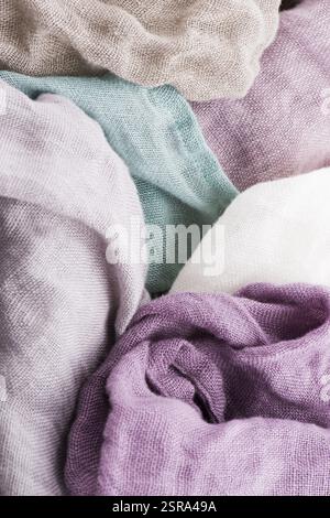 Multicolored textile with violet tones and colorful accents and rich, detailed texture, flax Stock Photo