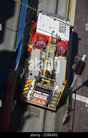 aerial view of Fire Rescue Victoria fire engine traveling to an incident on flinders street, Melbourne Stock Photo