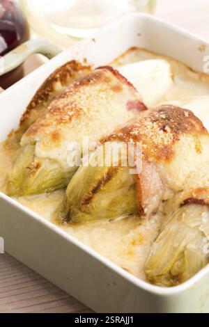 Chicory baked with bacon and cheese, lodz, poland Stock Photo