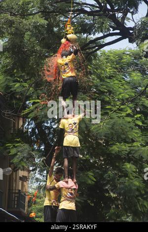 Human pyramid broken dahi handi, mumbai, maharashtra, india, asia Stock Photo