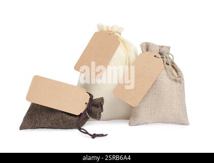 Burlap bags with tags isolated on white Stock Photo