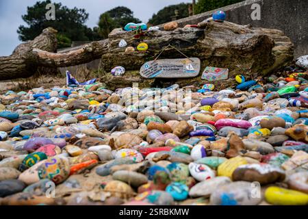 The Avon Beach Pebbles which are painted pebbles with messages left by people at Avon Beach, Christchurch, Dorset, England. Stock Photo