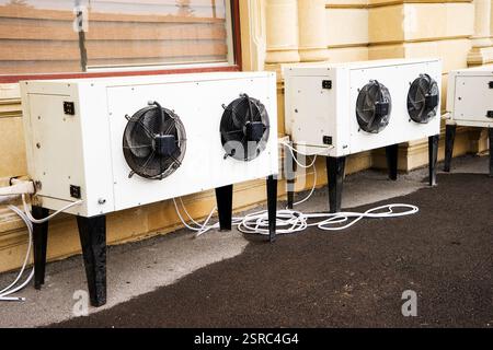 Perspective view of air conditioner compressor isolated on black studio ...