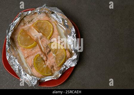 trout fish baked with lemon Stock Photo