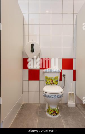 A Vibrant and Colorful Toilet Design Featuring Unique and Stunning Floral Decor Elements Stock Photo