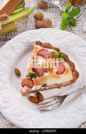 Rhubarb cakes with meringue and almonds Stock Photo