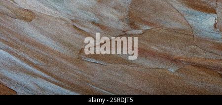 Close-Up of Silver and Brown Brushstrokes with Metallic Shimmer Stock Photo
