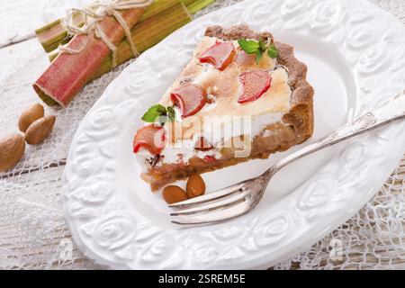 Rhubarb cakes with meringue and almonds Stock Photo