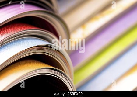 Stack of open magazines Stock Photo