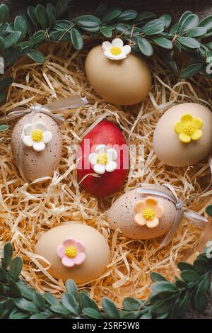 Easter decoration featuring colorful eggs arranged in a cozy nest Stock Photo