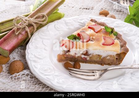 Rhubarb cakes with meringue and almonds Stock Photo