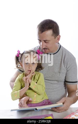 Father with daughter in read Stock Photo