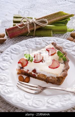 Rhubarb cakes with meringue and almonds Stock Photo