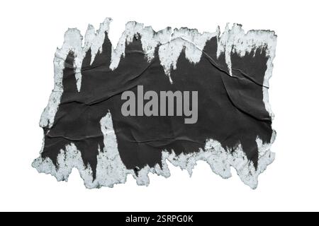 Peeled black paper poster texture with jagged edge on white background with clipping path Stock Photo