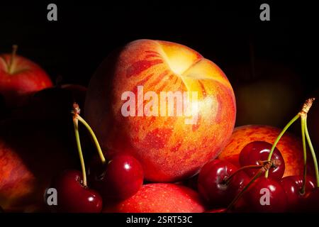 peach fruit mix on black background Stock Photo
