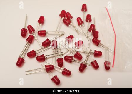 Red LEDs. The electronic component. Old LED elements. Stock Photo