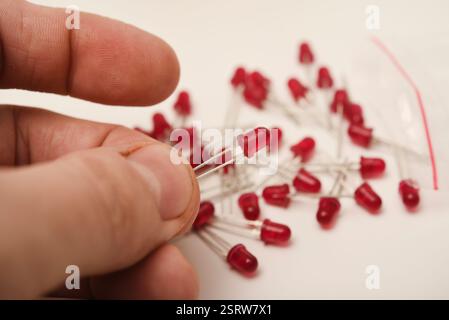 Red LEDs. The electronic component. Old LED elements. Stock Photo