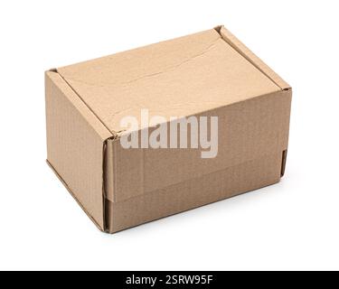Small closed cardboard box isolated on white background, ready for shipping Stock Photo