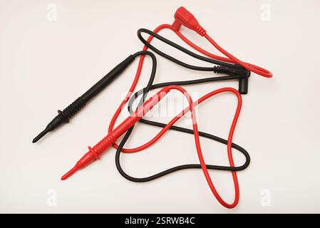 Probes for multimeter. The red and black wires of the measuring device. Stock Photo