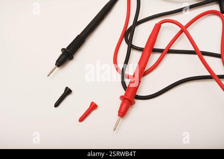 Probes for multimeter. The red and black wires of the measuring device. Stock Photo