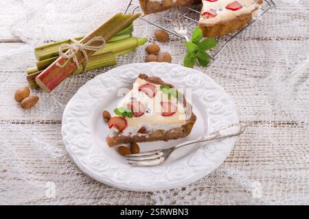 Rhubarb cakes with meringue and almonds Stock Photo