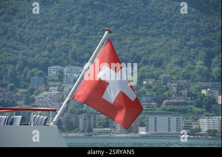 Swiss flag on the yatch in Lugano Stock Photo