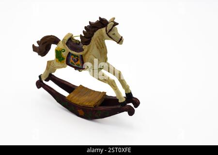 Miniature rocking horse figurine  on a white background. Rocking horse ornament Stock Photo