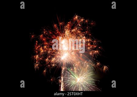 Colored fireworks on a black sky Stock Photo