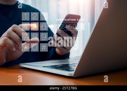 Two factor authentication or 2FA concept. Verification code with numbers pad press by man hand while using smart phone and laptop computer, validate p Stock Photo