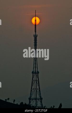 Sunset behind tv tower. Stock Photo