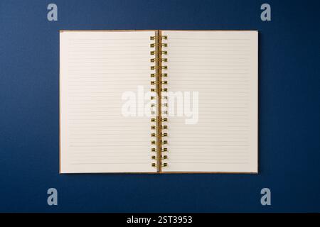 Open spiral notebook, blank pages. Ideal for notes, writing, planning Stock Photo