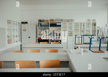 Classroom Setting Science Lab High school science lab table with a scale and glassware set up for ...