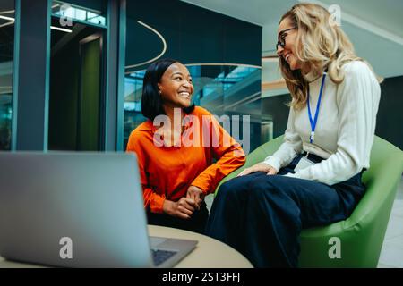 Financial analyst engaging with a client in the financial district, highlighting consulting, professionalism, and business growth within a modern offi Stock Photo