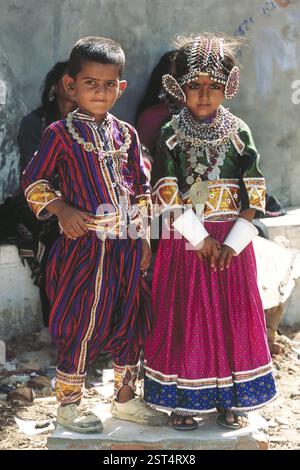 South Asian Indian boy and girl in traditional wearing at ravechi fair, rapar, bhuj, gujarat, india Stock Photo