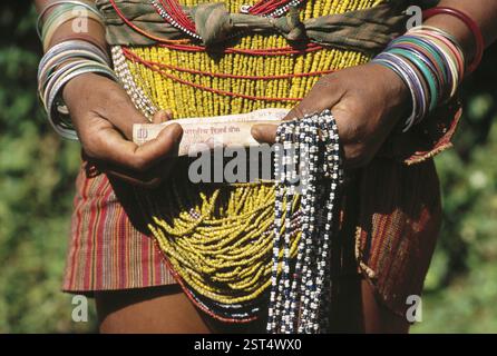 Woman holding money, Notes, rupees, Indian currency Stock Photo