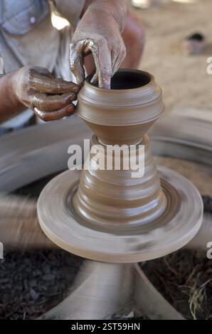 Potter making earthen pot, Close up on a traditional potter at work, india Stock Photo