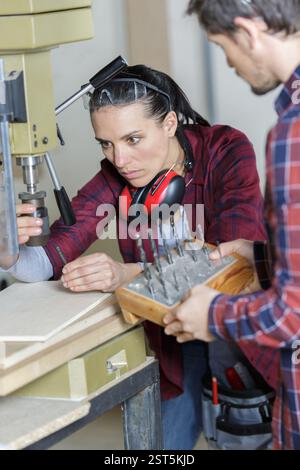 portrait of engineers using a milling machine Stock Photo
