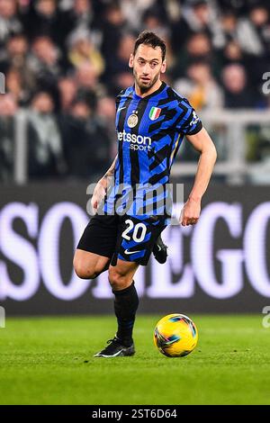 hakan-calhanoglu-of-fc-internazionale-in-action-during-the-uefa