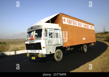 Industry, transportation, export container truck speeding on national highway number 3 Maharashtra, India, Asia Stock Photo