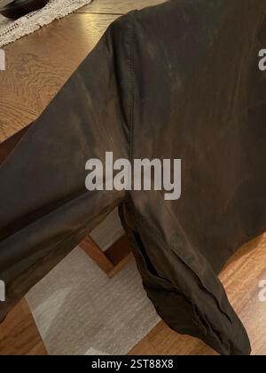 Old Aged Waxed cotton jacket Stylish men wax cotton water and wind proof jacket with beautiful tailored fit, metal zipper and fine craftsmanship fashi Stock Photo