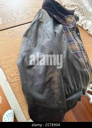 Old Aged Waxed cotton jacket Stylish men wax cotton water and wind proof jacket with beautiful tailored fit, metal zipper and fine craftsmanship fashi Stock Photo