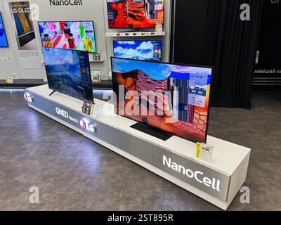 Lviv, Ukraine - February 16, 2025: Modern showroom showcasing LG televisions with NanoCell and QNED technologies. Stock Photo