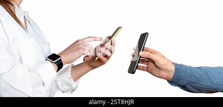 Mobile phones in hands of people on white background. Mobile payment technology. Scanning QR-codes. Near Field Communication. Stock Photo