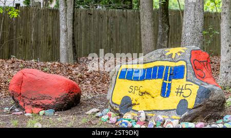 rock painted like a school bus Stock Photo